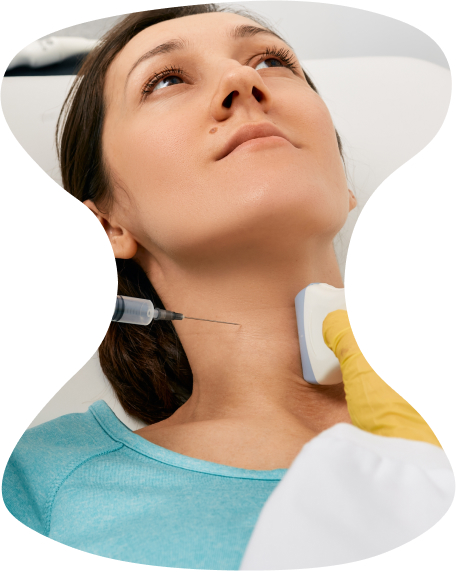 Image illustration of fine-needle aspiration biopsy on a female patient.